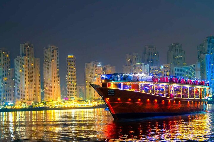 Experience a delightful evening on the water savoring a flavorful buffet dinner live entertainment and stunning views of Dubai Marina's illuminated skyline. A perfect escape for travelers.